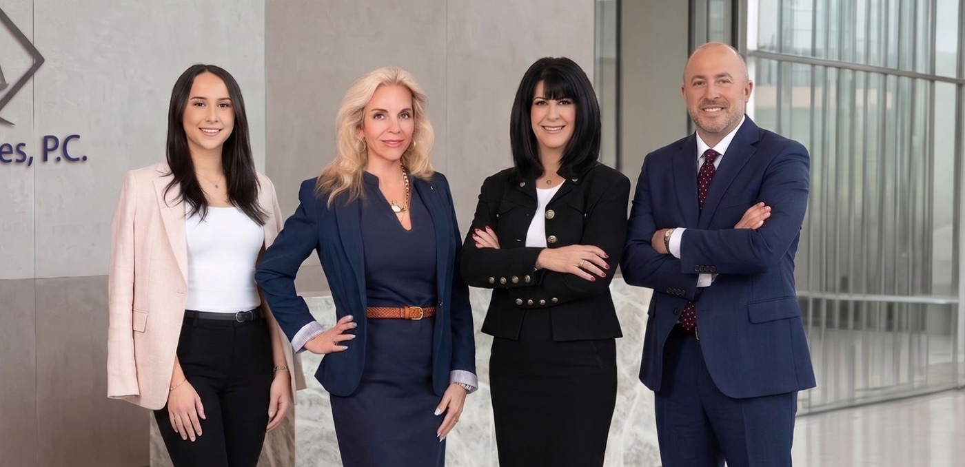 The attorneys and staff of Zeh & Associates, P.C. at their Melville, New York office
